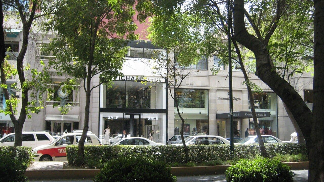 Tree-lined residential street and apartment buildings in Polanco, Mexico City